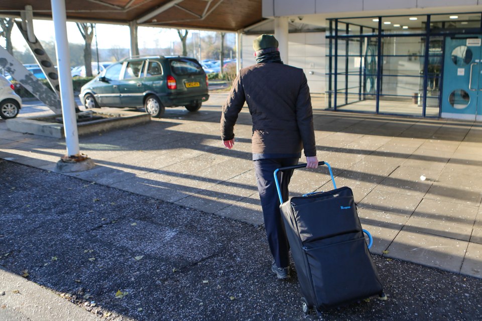 He was carrying a suitcase as he walked into court soon before jailed for 12 years