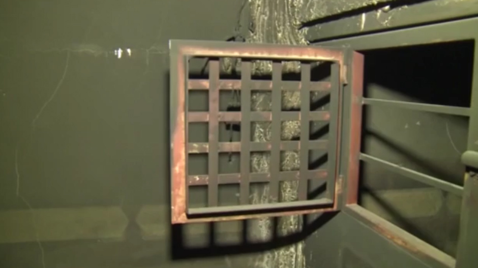 The metal doors of the jail cells were fitted with bolts and tiny windows with bars