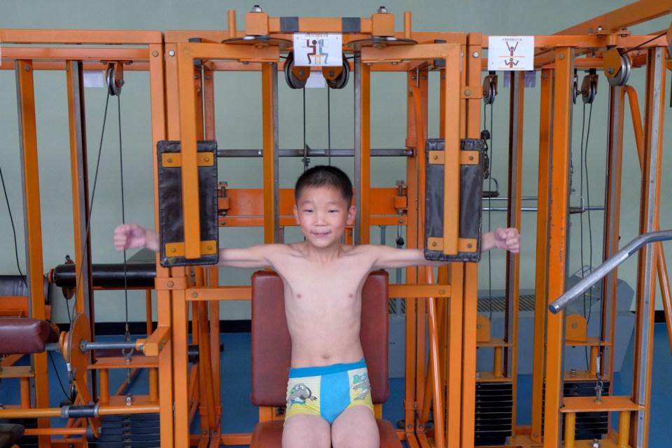 A child puts works out at a Pyongyang health complex