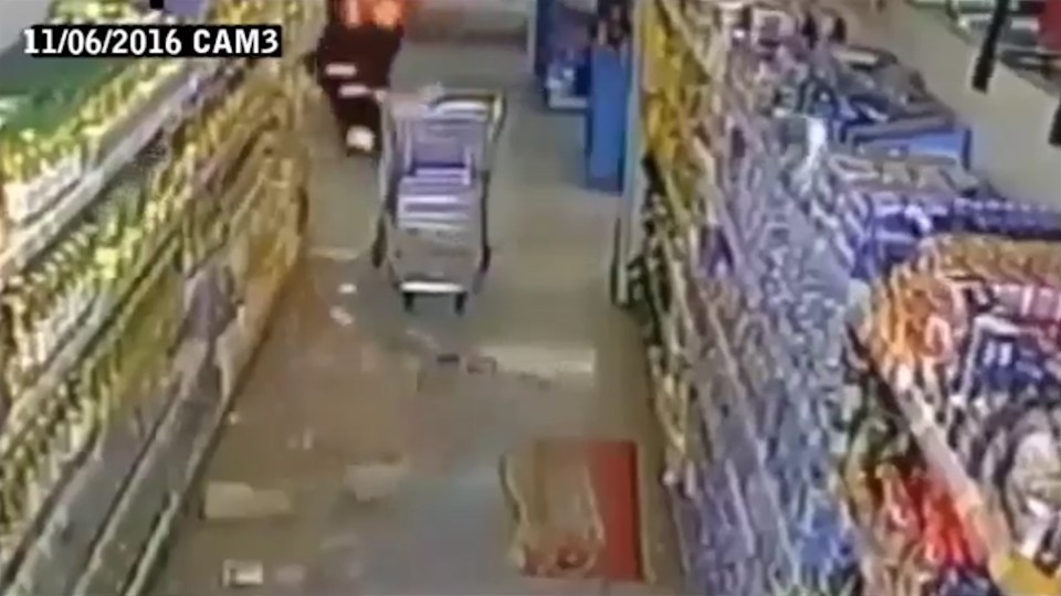 OKLAHOMA EARTHQUAKE: Watch the moment shopper runs for cover and floor shakes.