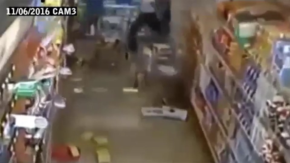OKLAHOMA EARTHQUAKE: Watch the moment shopper runs for cover and floor shakes.