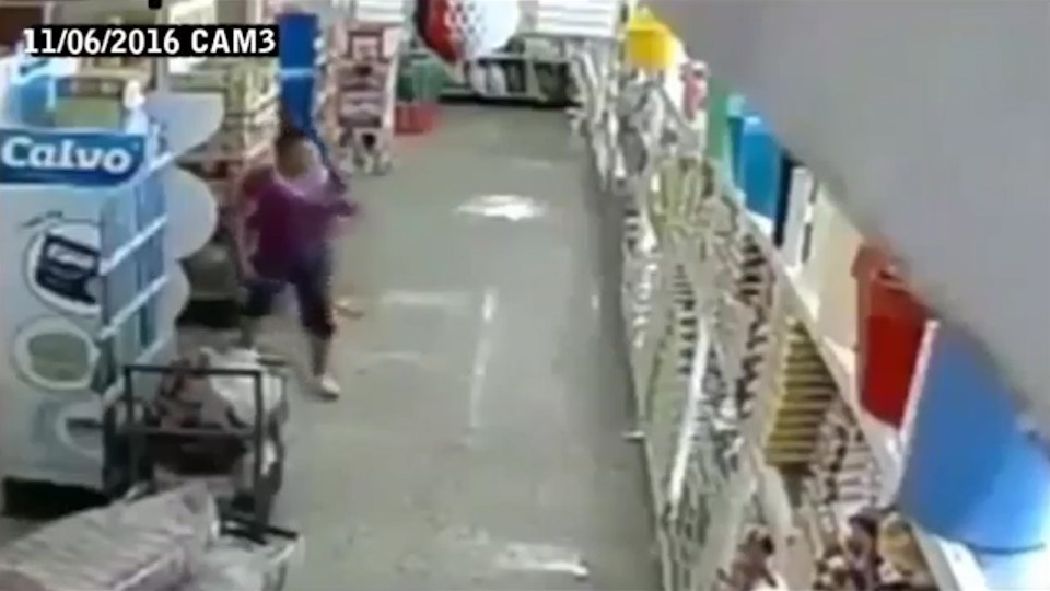 OKLAHOMA EARTHQUAKE: Watch the moment shopper runs for cover and floor shakes.