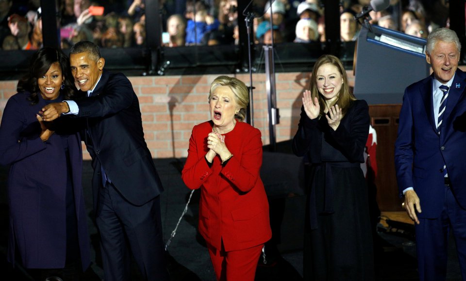 Democratic presidential candidate Hillary Clinton reacts during a campaign rally along with first lady Michelle Obama (L), President Obama, Chelsea Clinton (2nd L) and Bill Clinton in Philadelphia, Pennsylvania November 7, 2016. REUTERS/Kevin Lamarque