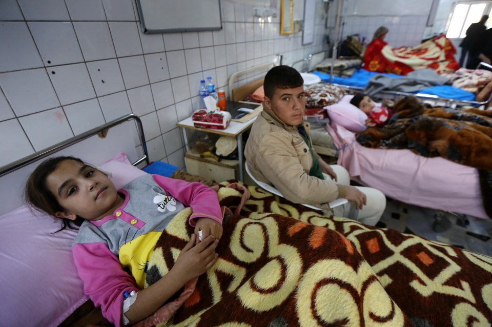 Wounded Iraqi children who were injured in the fighting in Mosul 