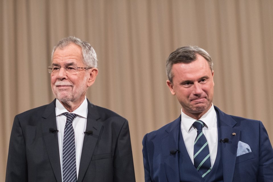 Austrian candidates Norbert Hofer, right, and Alexander Van der Bellen left, for presidential elections at a television debate