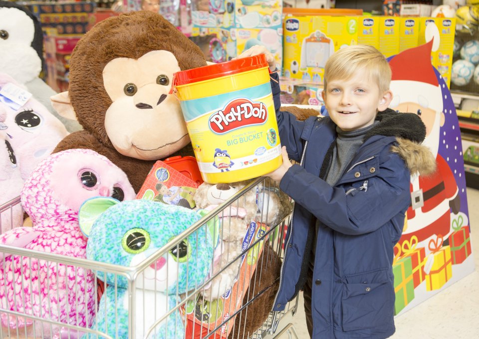 Big hugs . . . little helper gets into the festive spirit for Sun campaign