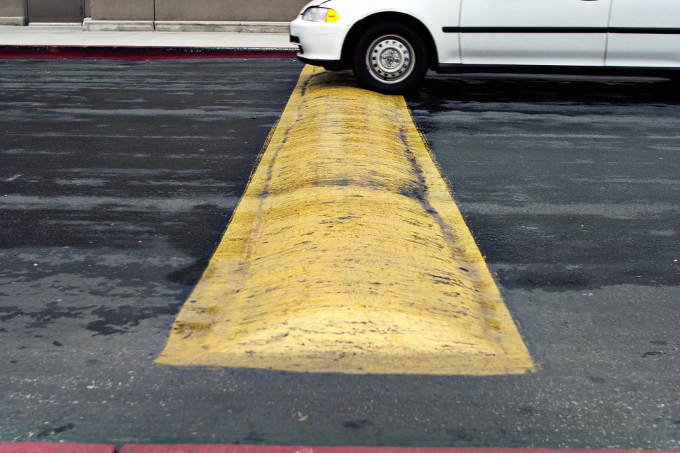 Car and speed bump