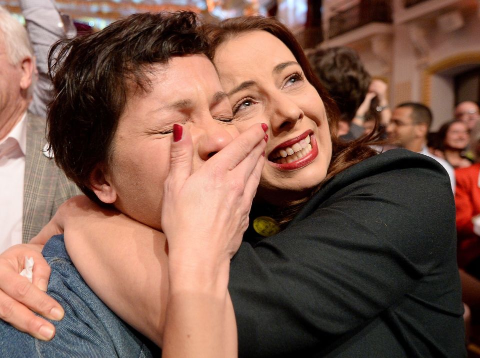 Others were seen welling up with joy as they hugged each other following the announcement that Hofer had conceded 