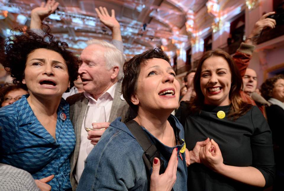 Van der Bellen's supporters were pictured celebrating the preliminary result in Vienna 