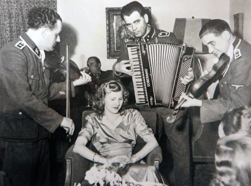 Eva Braun being serenaded by Nazi musicians
