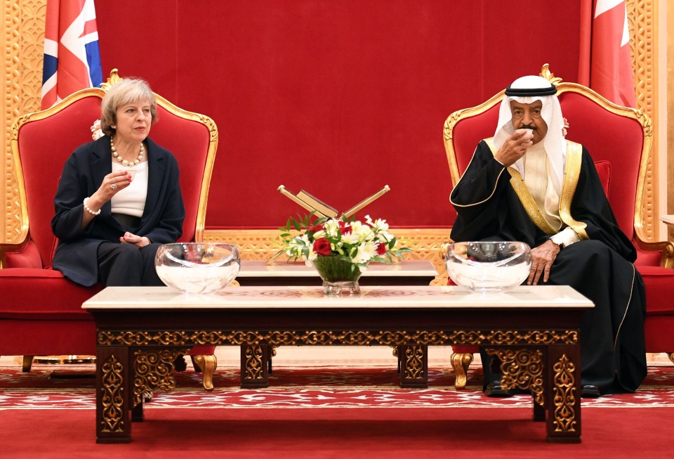 Sheik it off ... Mrs May arrived in Bahrain to address the Gulf Cooperation Council and visit British serviceman