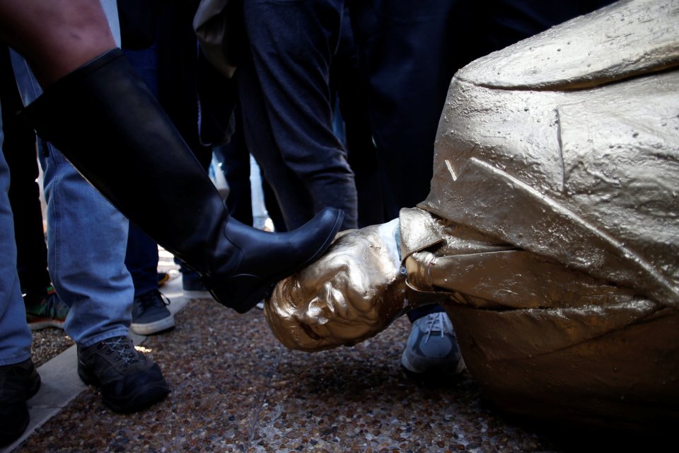 The effigy of "Bibi" as he is known by his supporters was toppled by an angry member of the public