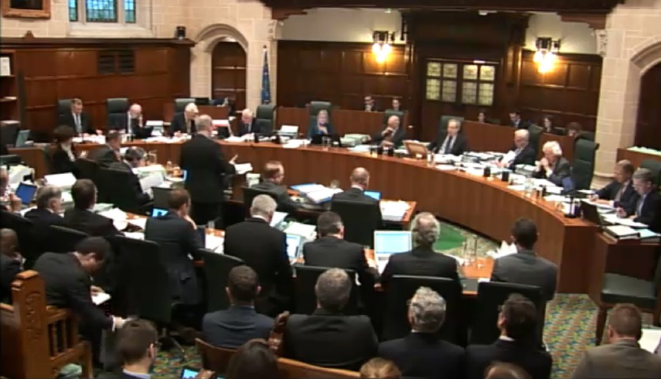 A grab taken from the televised live feed shows Scotland's Lord Advocate, James Wolffe QC (R), speaking at the Supreme Court on the third day of a hearing to decide whether or not parliamentary approval is needed