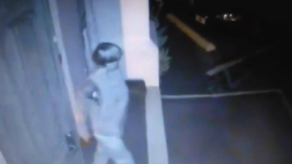  The chilling moment Roof sneaks out of the church carrying a gun