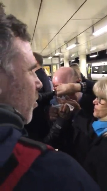 Passengers tried to help another who was hurt in a scuffle