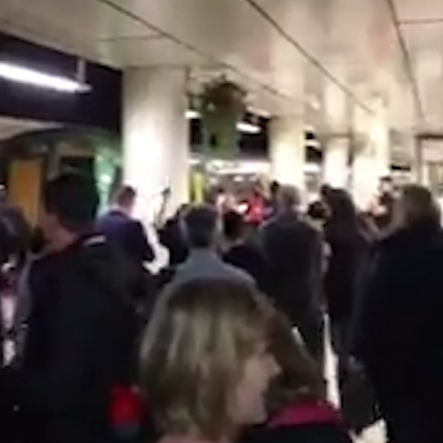 Frustrated crowds began to chant for a train as they were hit by serious delays