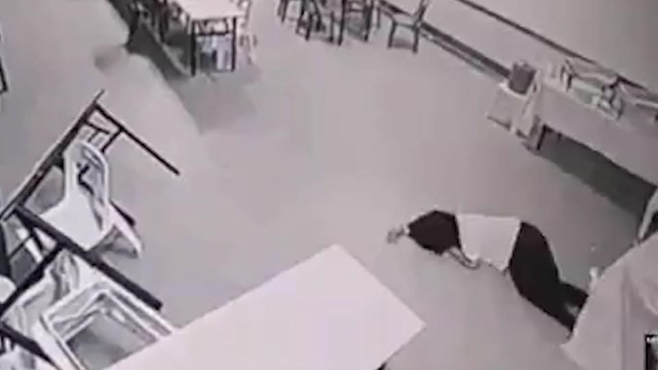 The worker is then flung on the floor