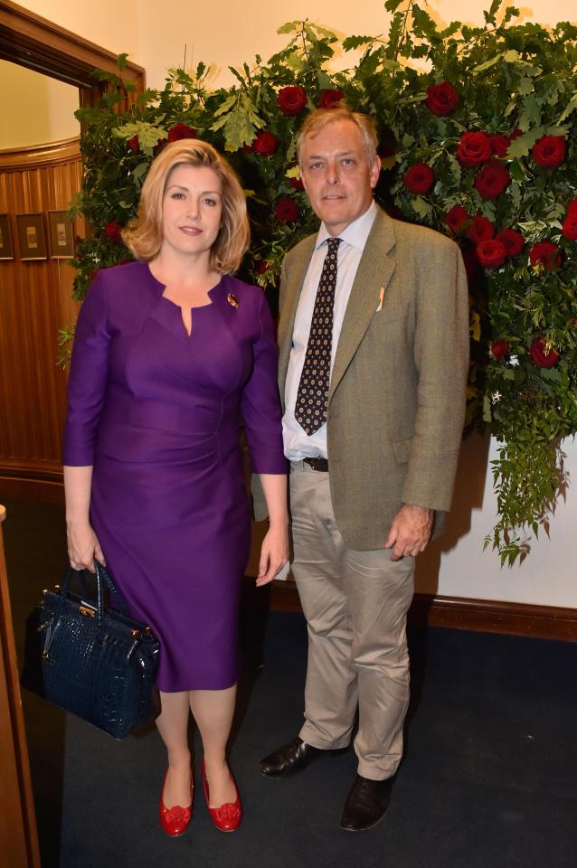  In happier times . . . saucy Tory Minister Penny and her former partner Ian