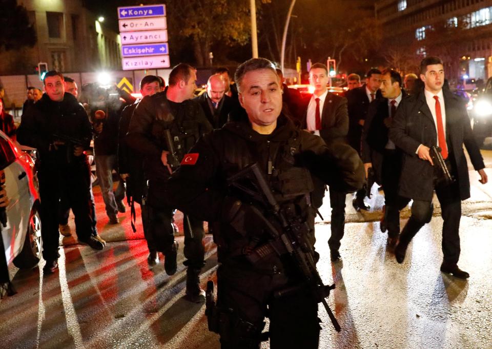 Turkish police secure the area after the shooting