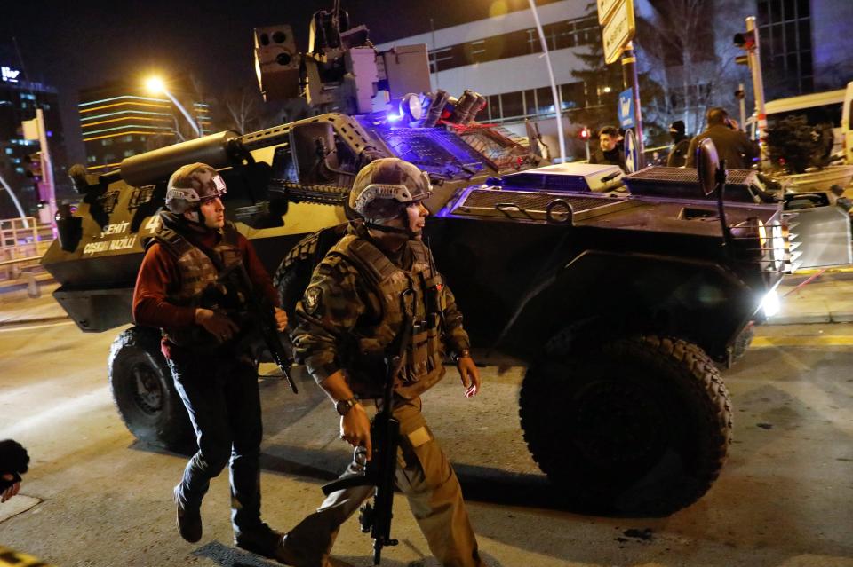 Turkish police secure the area near an art gallery where the Russian Ambassador to Turkey Andrei Karlov was shot