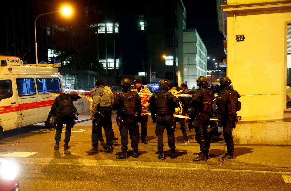  Cops gather at the scene of the triple shooting in Zurich