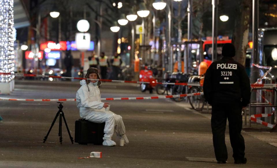  Forensics officers were investigating the scene of the carnage in Berlin late into the night