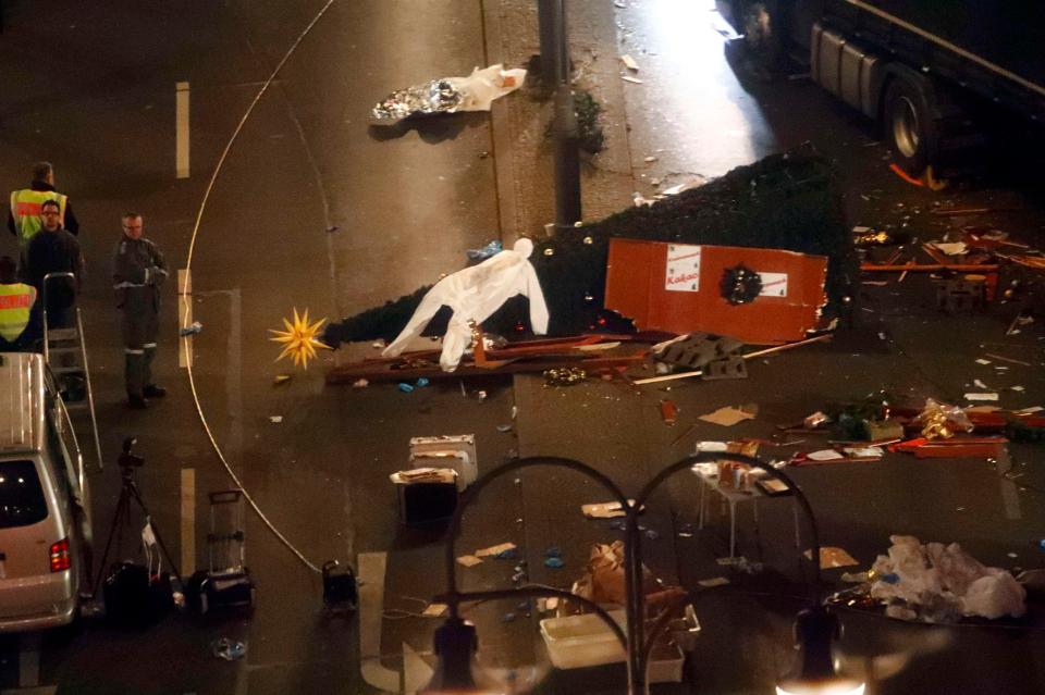 Christmas decorations were strewn across the street after the lorry smashed its way through terrified crowds