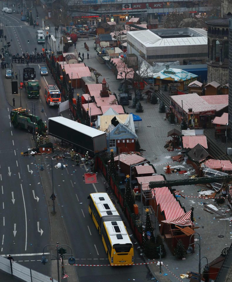  Pictured is the scene of devastation caused by Monday's truck attack in Berlin. Twelve were killed and nearly 50 injured