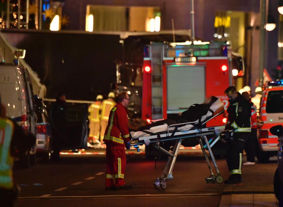  It ploughed into the busy Christmas market leaving a trail of blood in its wake