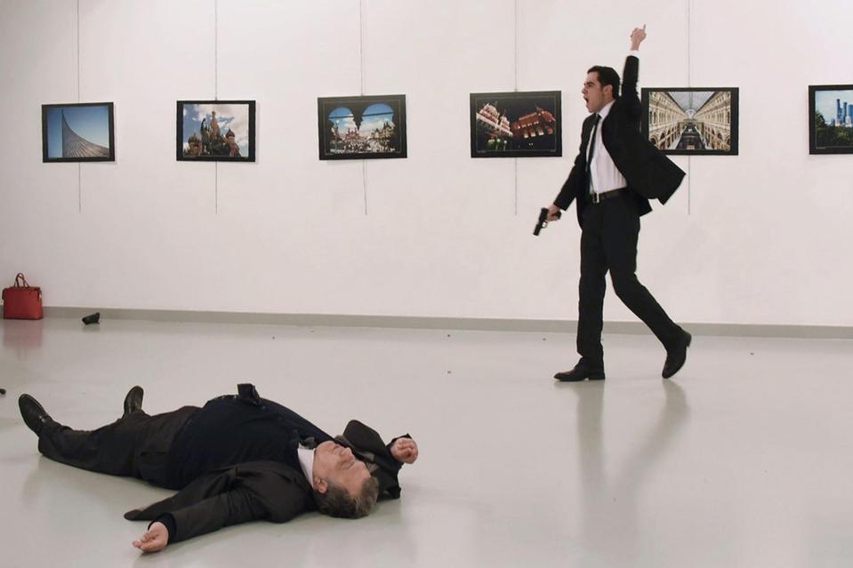 The shocking moment the ambassador was killed in front of a terrified group of attendees and journalists