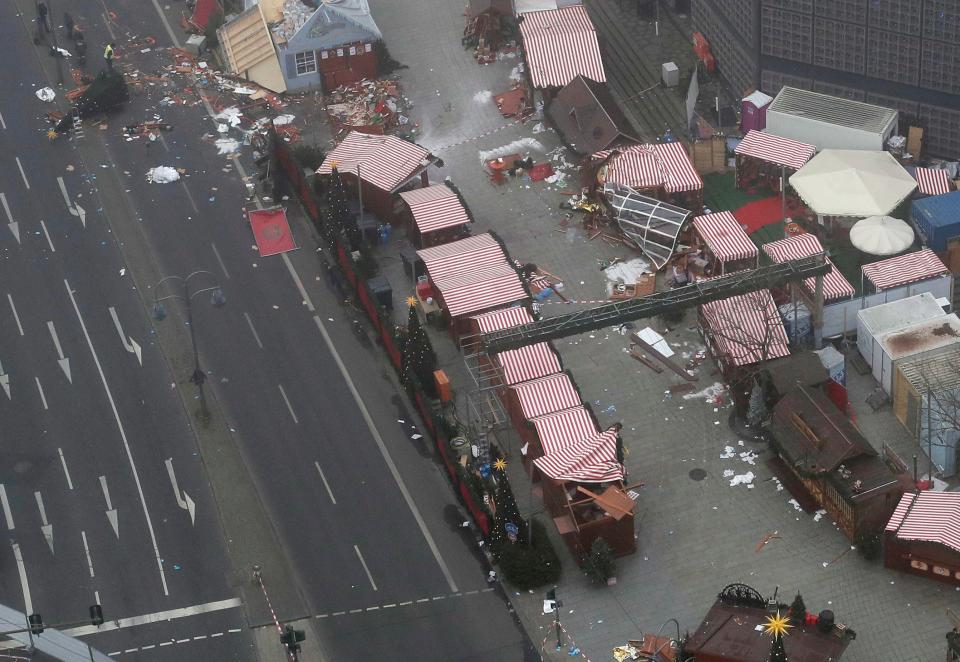  The lorry's trail of destruction was made clear as several stalls lay destroyed on the market floor