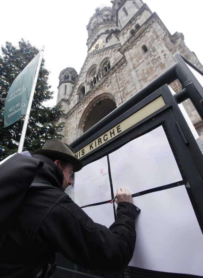  Elsewhere, Berliners signed condolence wishes to those killed last night