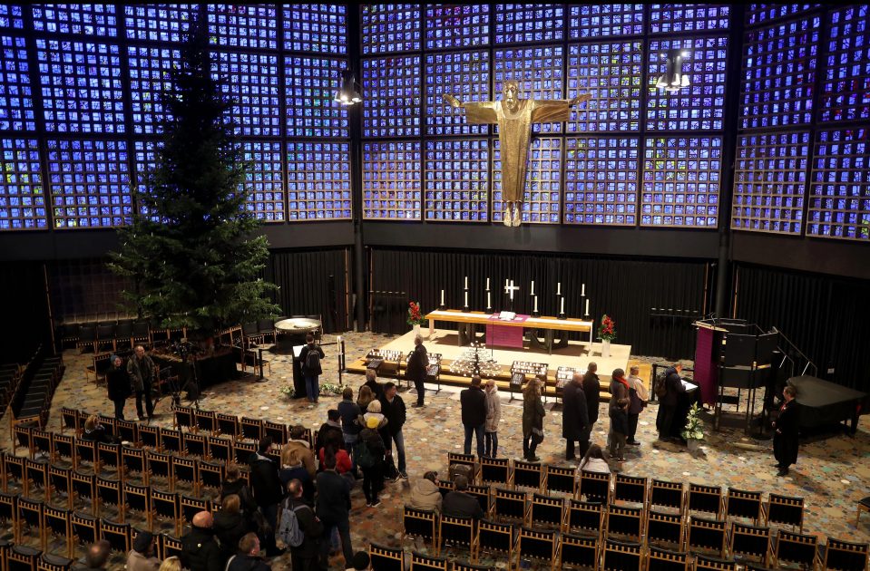  Mourners attended a service at the Kaiser Wilhelm Memorial Church near the scene of the attack this morning