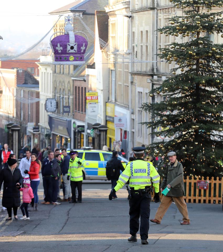  Police officers standing out from the crowds of shoppers today in Windsor