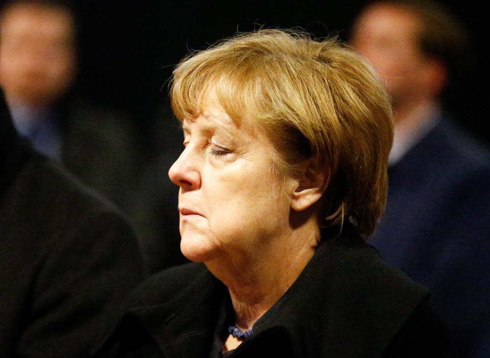  Merkel appeared strained as she attended a church ceremony at the Kaiser Wilhelm chapel in Berlin