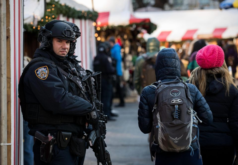  Heavily armed cops spotted on guard at the Columbus Circle Holiday Market in New York