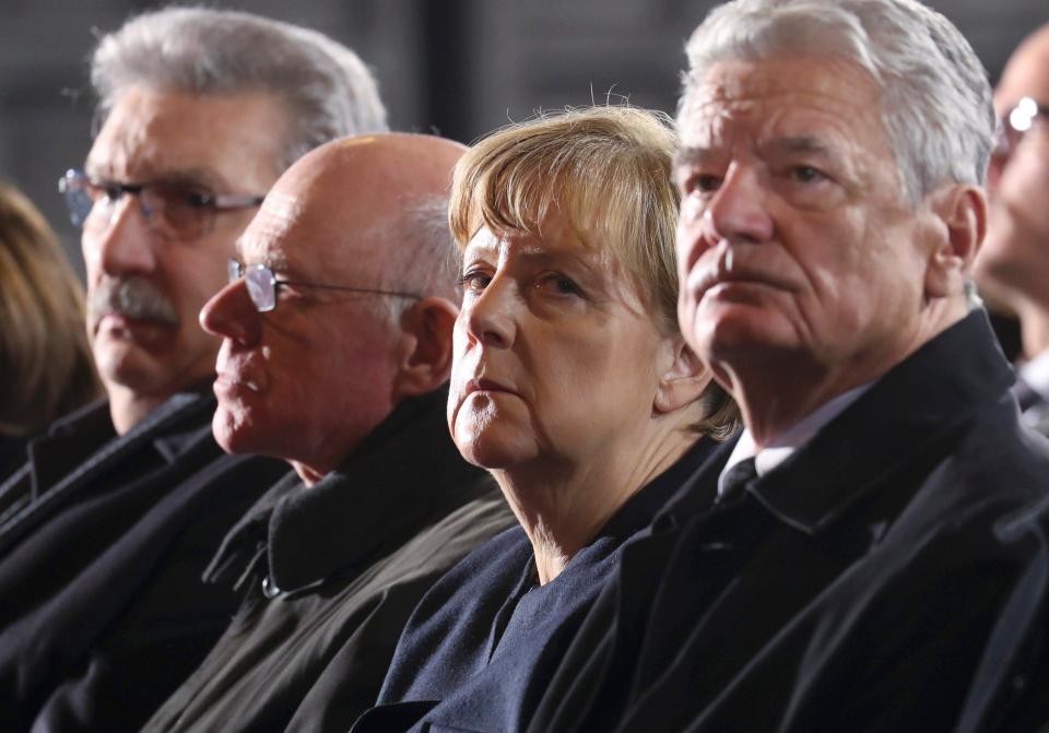  Pictured from right to left at the ceremony today is German President Joachim Gauck, Chancellor Angela Merkel and President of Germany's lower house of parliament Norbert Lammert