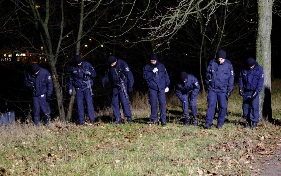 Cops scour the canal bank near where the Polish lorry driver parked the vehicle yesterday