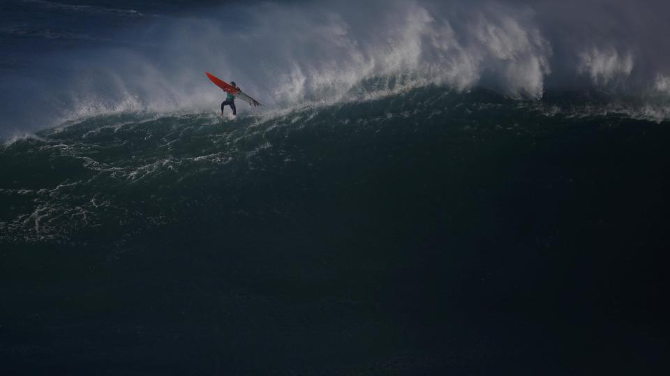  A stunning image captured Tom Butler at the top of the huge wave during the competition in Portugal