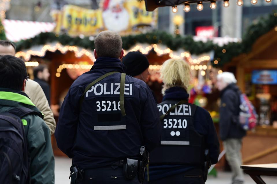 A heavy police presence is seen at the market as it reopens