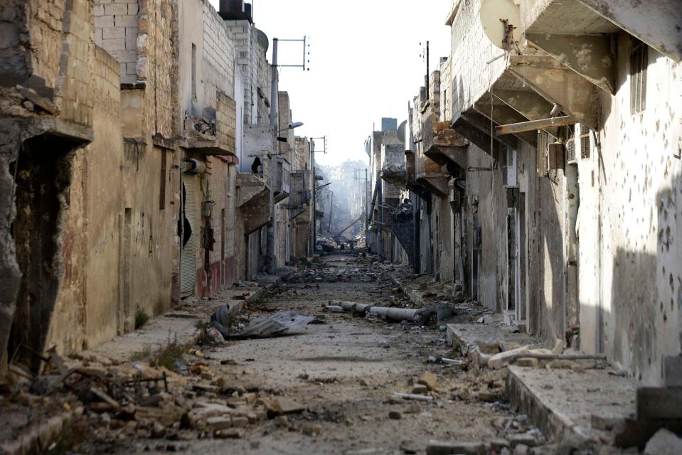 Destroyed houses are seen in the east Aleppo neighborhood of Tariq al-Bab