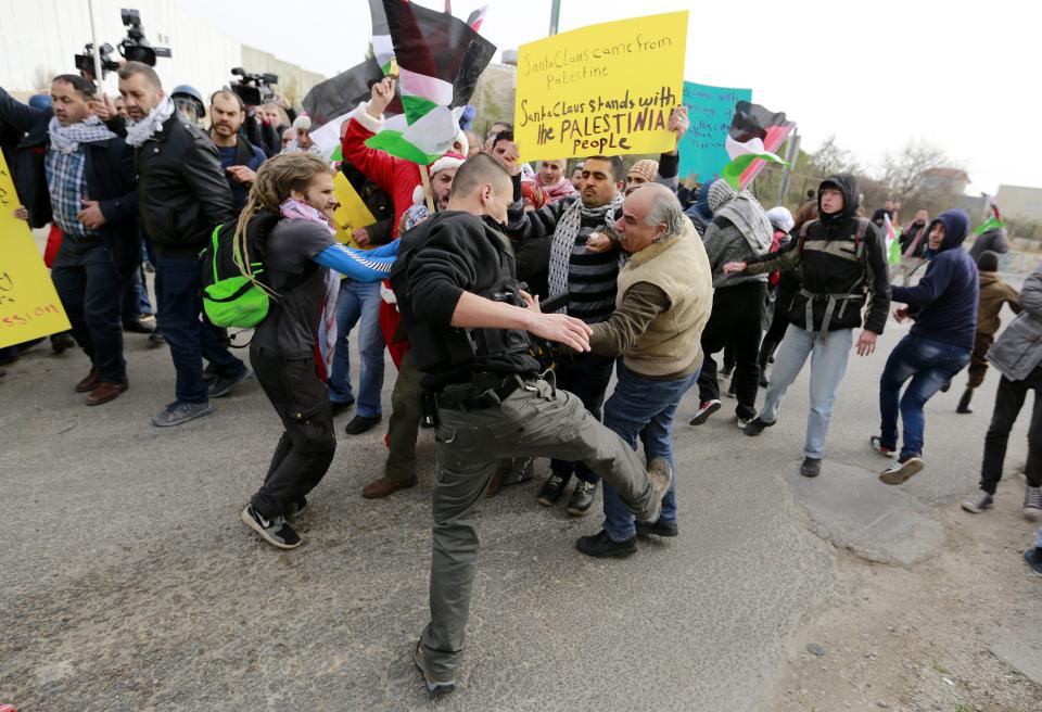 Israel has angrily defended the controversial settlements