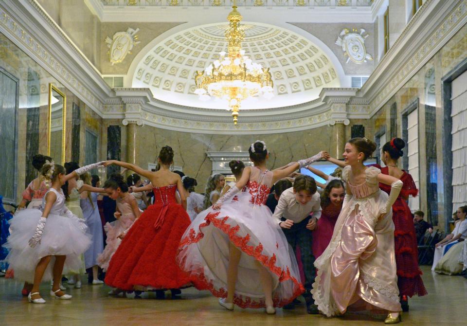  Junior ballerinas, sailors and soldiers danced under the chandelier