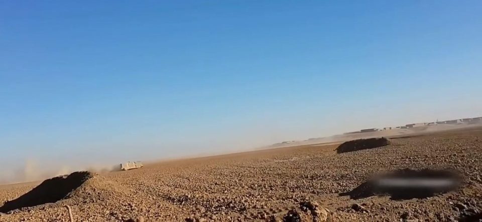  The death truck is filmed moving at speed across the desert near Mosul