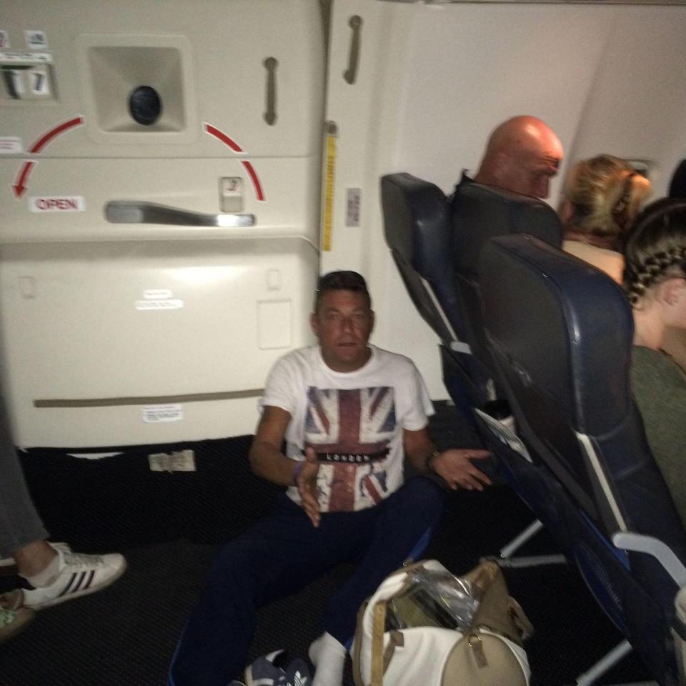  Andy Hookey was left fuming after claiming he was forced to sit on the plane floor as there 'were no seats'