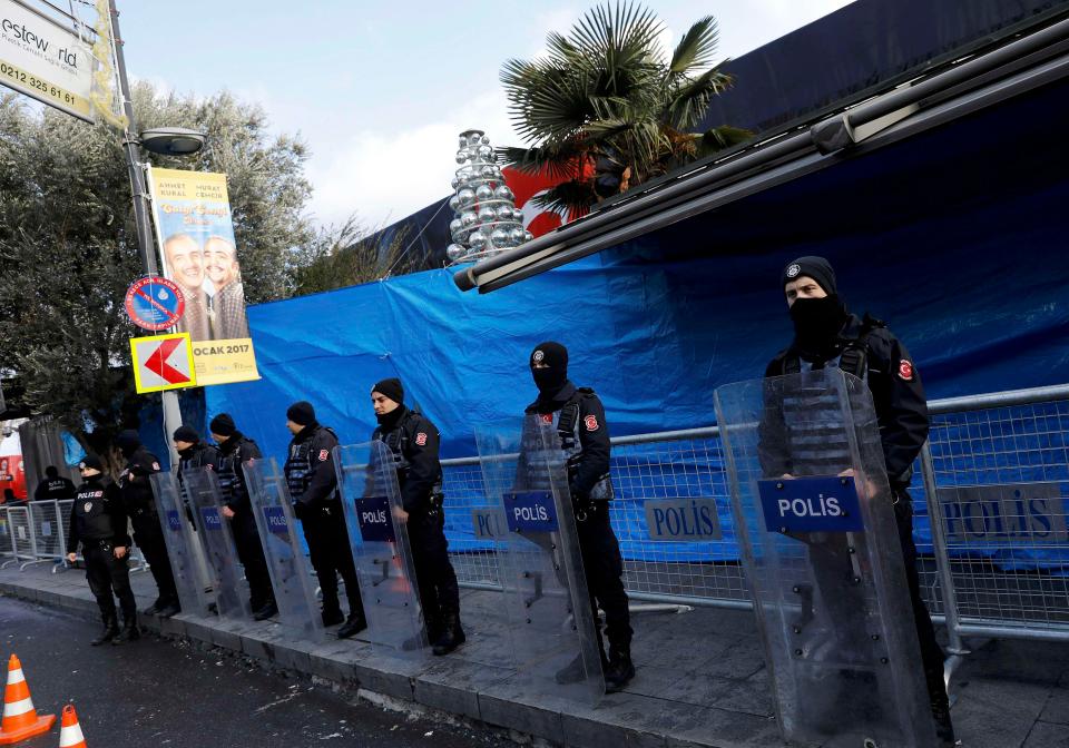 Turkish police stand guard outside the closed Reina nightclub today