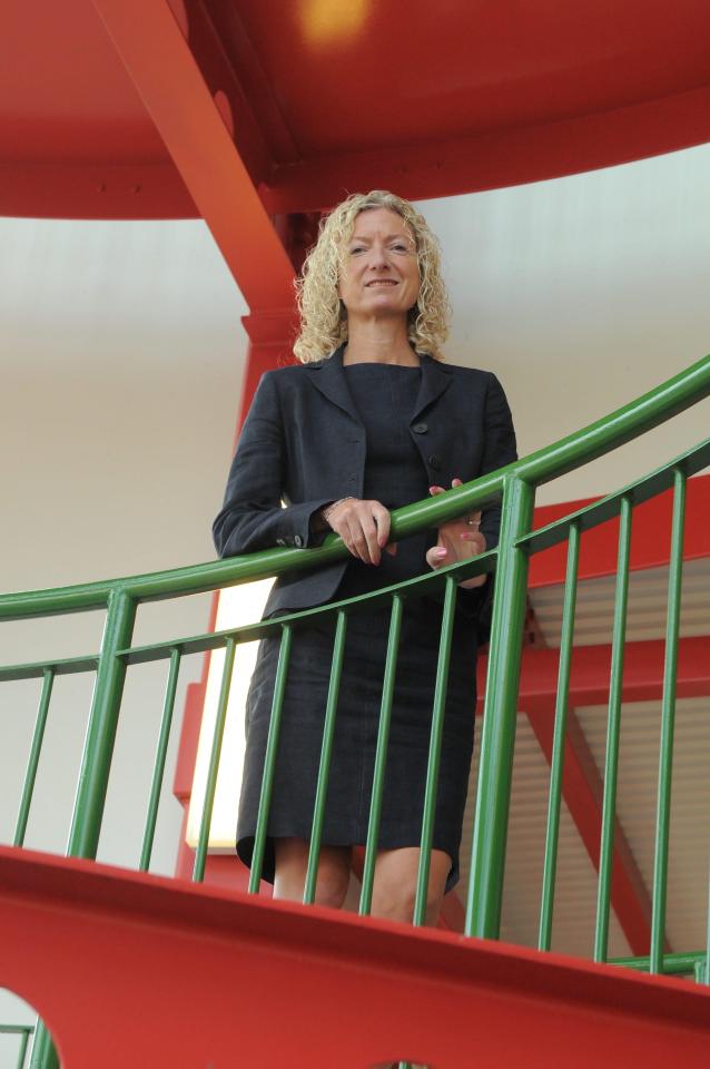 Principal Alison Colwell, wearing a knee-length skirt, has been criticised by parents for her strict stance