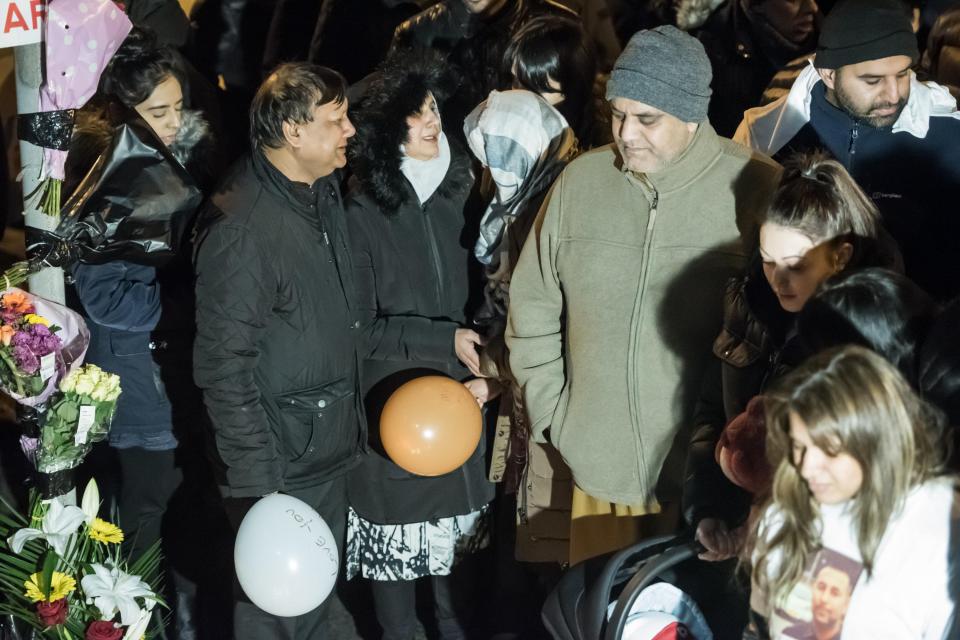  The 28-year-old's parents held each other as they sobbed at the front of the vigil