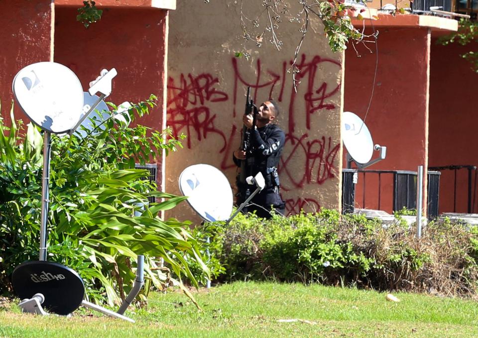  Armed cops surrounded the block where Loyd was holed up