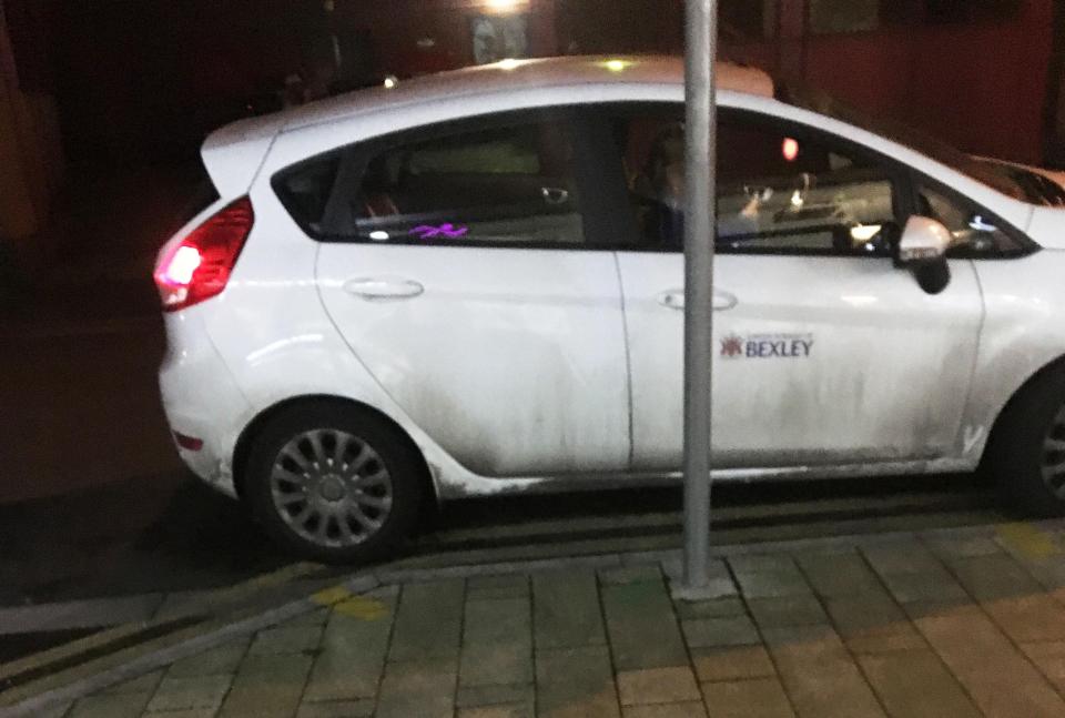  A council traffic warden is pictured parked on double yellow lines in Bexleyheath, south east London